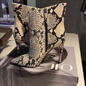 Jennifer Lopez Black and Cream Heeled Boots